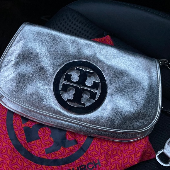 Tory Burch Handbags - Sale! Silver Tory Burch clutch! Perfect for Spring!